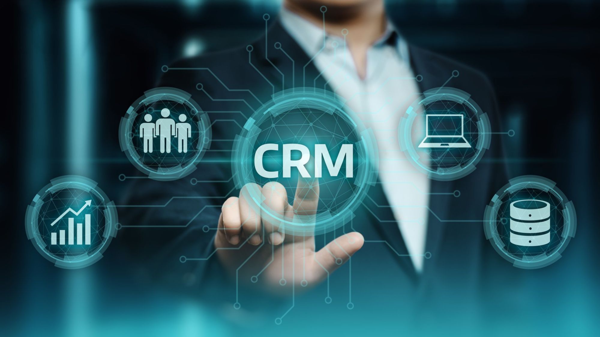 A businessman digitially representing the importance of CRM solutions