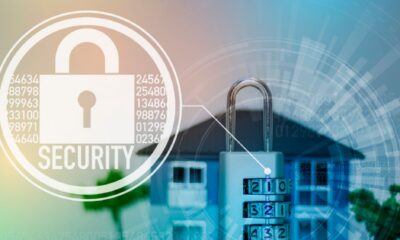 House and padlock on digital background symbolize protection and safety for rental property