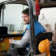 young man working in skip hire company